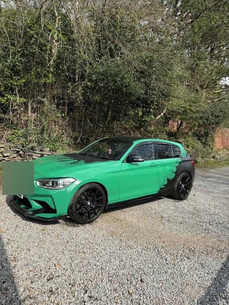 BMW 1 Series in gloss green with black splitter and gloss black wheels